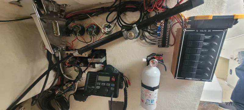 Slide: The Image of Electrical panel and wiring inside a 1985 SISU Softtop Cruiser boat. - 13