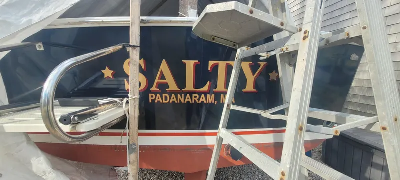 Slide: The Image of 1985 SISU Softtop Cruiser named "Salty" in Padanaram, MA, with ladders and railings. - 20