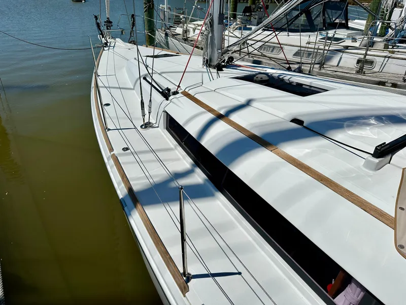 Slide: The Image of 2018 Jeanneau Sun Odyssey 419 sailboat deck with sleek design and modern fittings. - 18