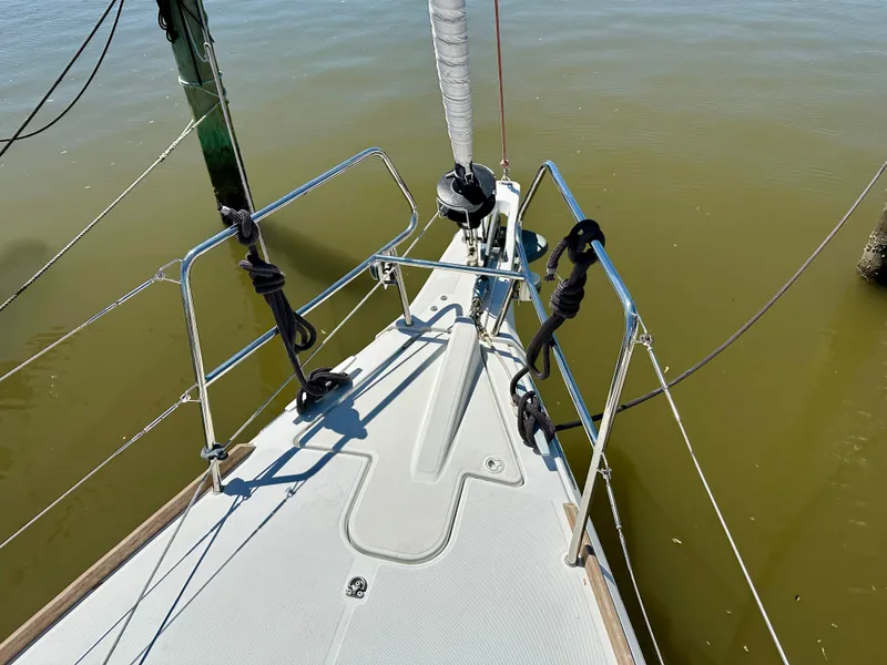 Slide: The Image of 2018 Jeanneau Sun Odyssey 419 sailboat deck with railing and ropes. - 21