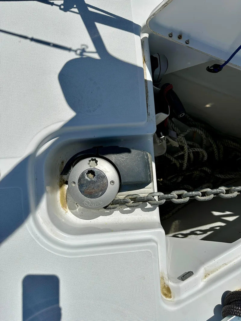 Slide: The Image of 2018 Jeanneau Sun Odyssey 419 anchor chain and windlass on deck. - 22