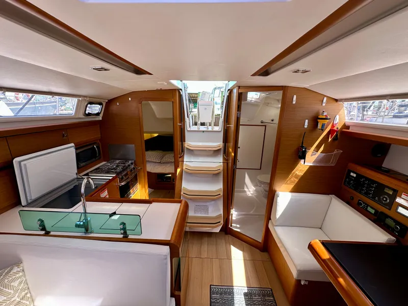 Slide: The Image of Interior of 2018 Jeanneau Sun Odyssey 419 sailboat, featuring modern design and cozy seating. - 33