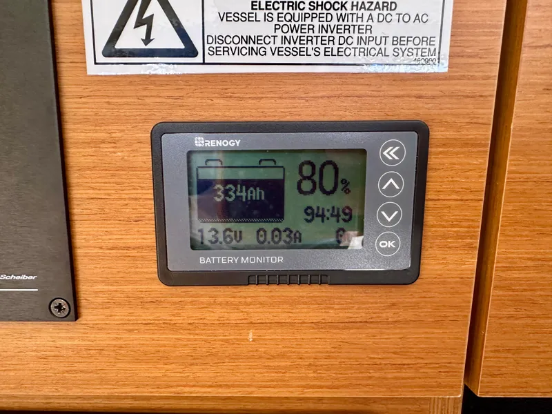 Slide: The Image of Battery monitor on 2018 Jeanneau Sun Odyssey 419, showing 80% charge and 334Ah capacity. - 37