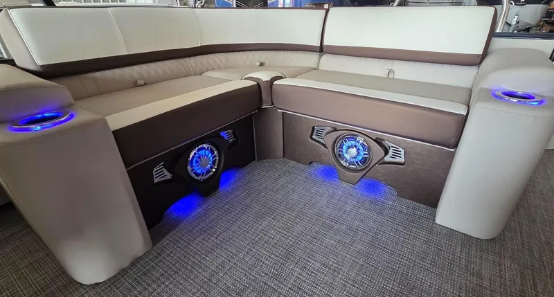 Slide: The Image of Luxurious seating with blue LED lights on Avalon Platinum Catalina 2385 Elite, 2025 model. - 15