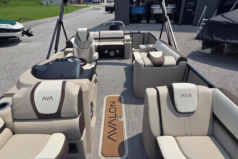 Slide: The Image of 2025 Avalon Platinum Catalina 2385 Elite pontoon boat with luxurious seating and modern design. - 6