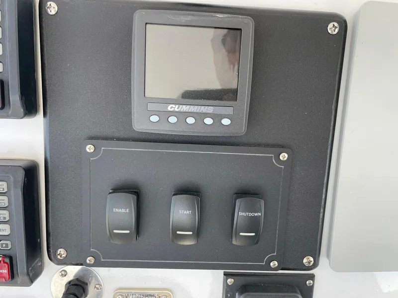 Slide: The Image of Control panel of a 1986 Egg Harbor 41 Convertible boat with Cummins display. - 20