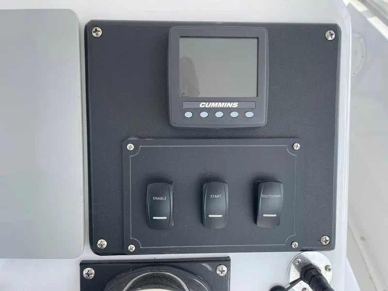 Slide: The Image of Control panel of a 1986 Egg Harbor 41 Convertible boat with Cummins display. - 21