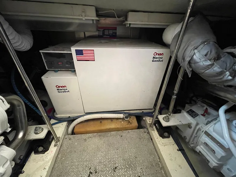 Slide: The Image of Engine room of 1986 Egg Harbor 41 Convertible with Onan Marine GenSet. - 31