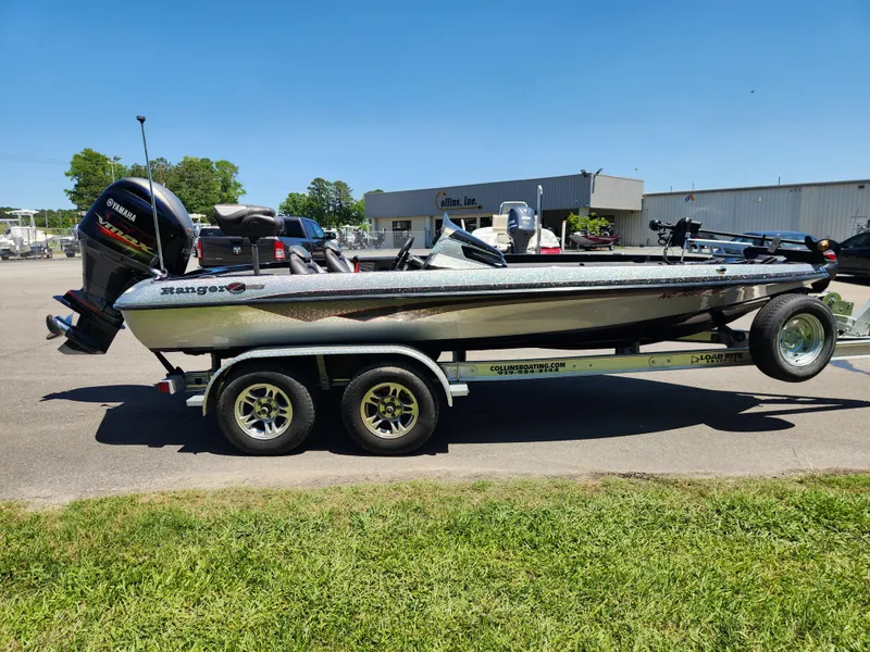 Slide: The Image of 2017 Ranger Z518 boat on trailer, parked outdoors, sunny day. - 5