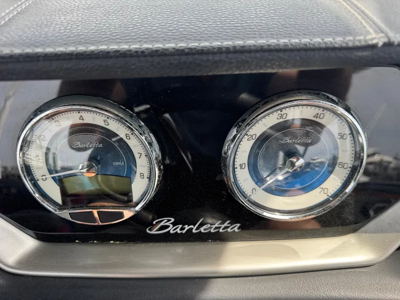 Slide: The Image of Dashboard of 2021 Barletta L25UE with speedometer and tachometer gauges. - 17