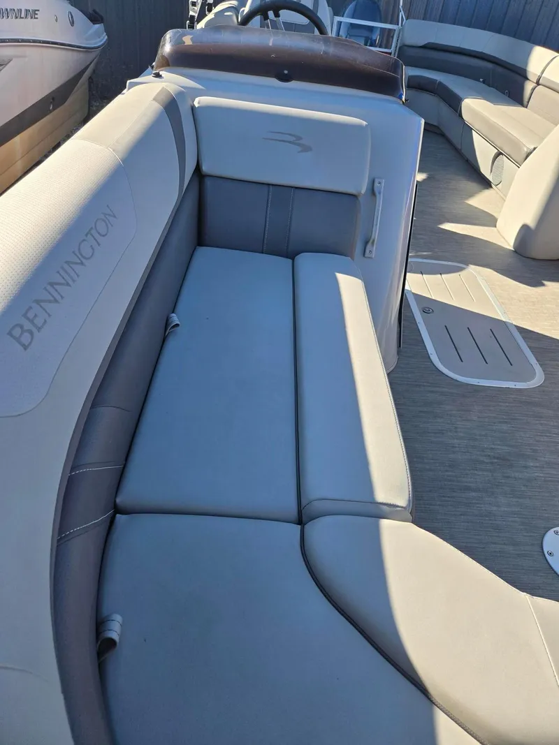 Slide: The Image of 2023 Bennington 22SXSRC boat interior with comfortable seating and modern design. - 16