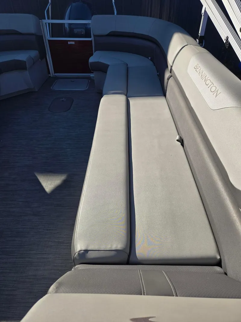 Slide: The Image of 2023 Bennington 22SXSRC boat interior with spacious seating and modern design. - 19