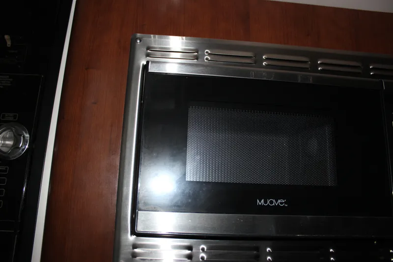 Slide: The Image of Built-in microwave oven in Crownline 294 CR boat, 2021 model. - 31
