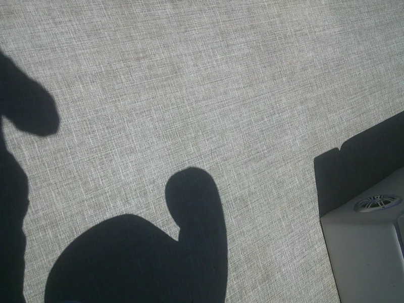 Slide: The Image of Shadows on textured surface of Qwest 816 Edge 4 point Fish boat, 2022 model. - 6