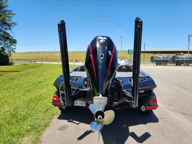 Slide: The Image of 2022 Ranger Z519 boat with powerful outboard motor, parked on sunny day. - 3