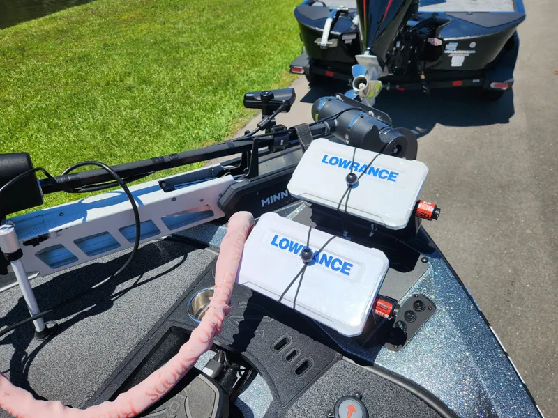 Slide: The Image of 2022 Ranger Z519 boat with Lowrance electronics and Minn Kota trolling motor on a sunny day. - 8