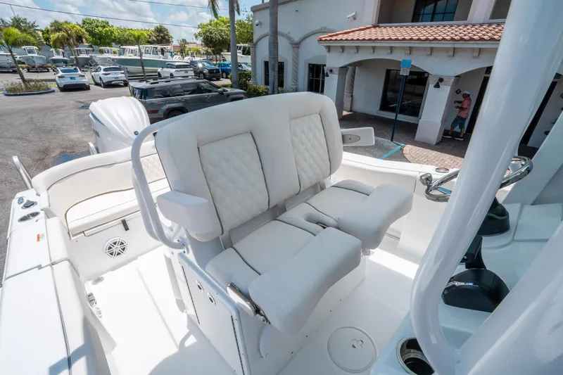 Slide: The Image of 2025 Sea Hunt Ultra 245 SE boat interior with luxurious seating and modern design. - 24