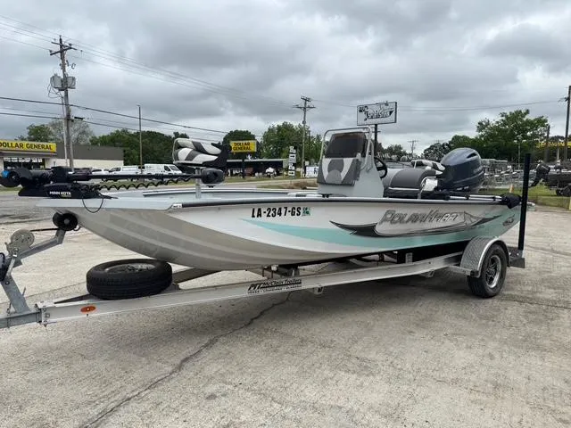 Slide: The Image of 2023 Polar Kraft 190 Sport X boat on trailer, parked outdoors under cloudy sky. - 4