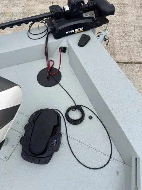 Slide: The Image of 2023 Polar Kraft 190 Sport X boat deck with Minn Kota trolling motor and foot pedal. - 7