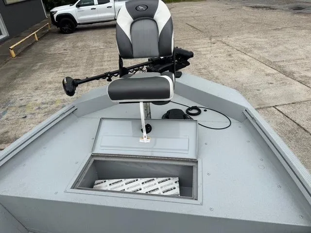 Slide: The Image of 2023 Polar Kraft 190 Sport X boat with a mounted seat and storage compartment. - 8