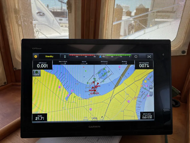 Slide: The Image of Garmin GPS display on 1999 Diesel Duck Trawler, showing nautical navigation map. - 11