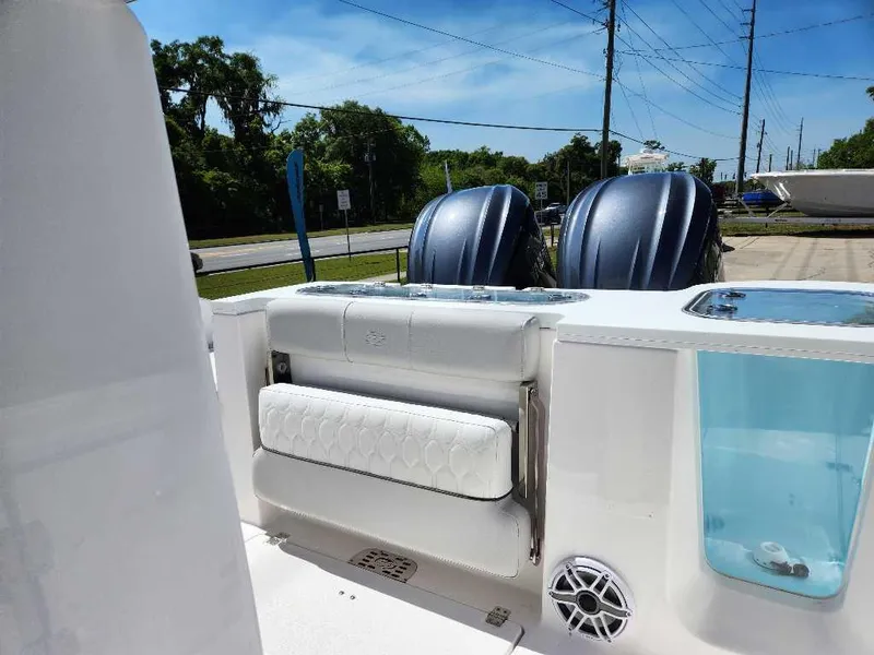 Slide: The Image of 2023 Sea Fox 288 Commander boat interior with dual engines and seating. - 3