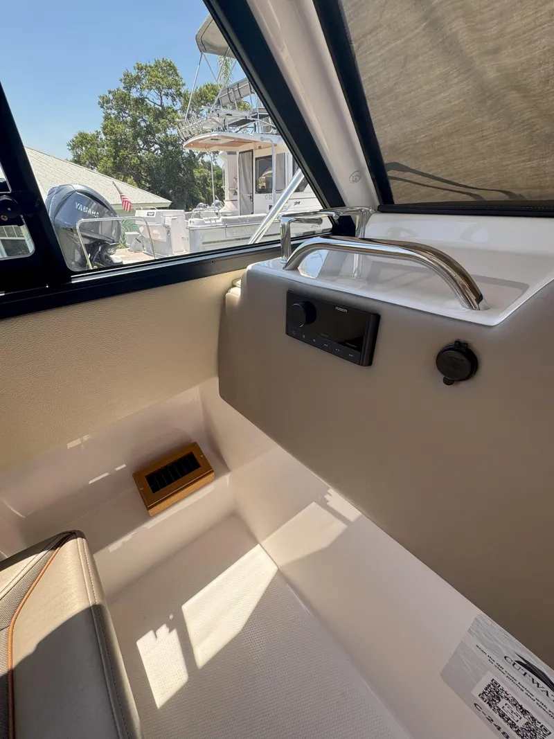 Slide: The Image of 2025 Cutwater C-248 Coupe interior with modern design and sleek controls. - 8