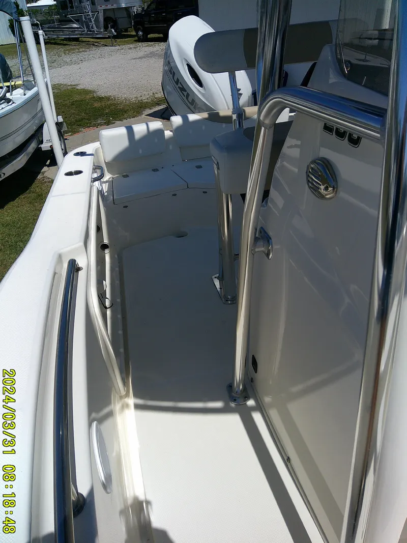 Slide: The Image of 2024 Bulls Bay 200 CC boat interior with seating and console. - 14