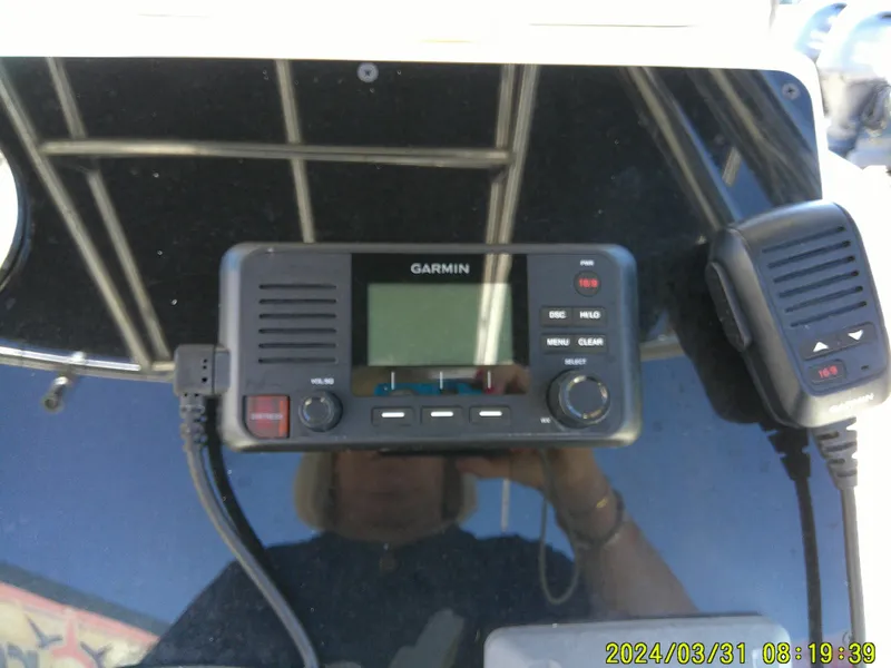 Slide: The Image of Garmin marine radio on Bulls Bay 200 CC boat dashboard, 2024 model. - 22