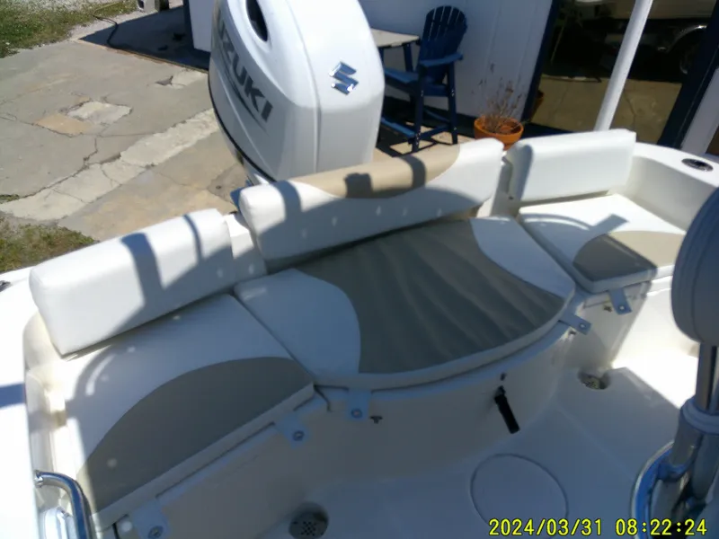 Slide: The Image of 2024 Bulls Bay 200 CC boat interior with Suzuki engine, featuring comfortable seating. - 28