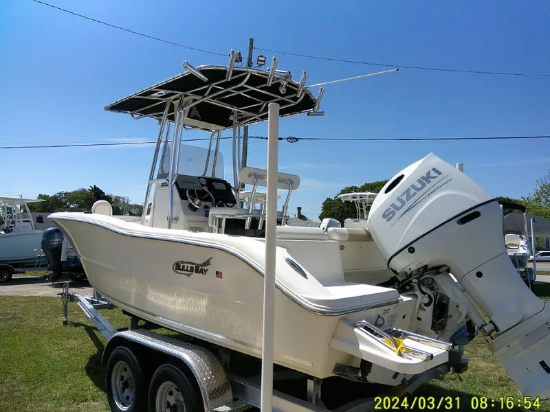 Slide: The Image of 2024 Bulls Bay 200 CC boat with Suzuki outboard engine on trailer. - 5