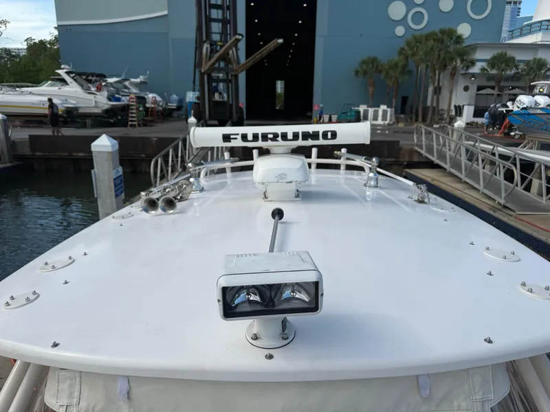 Slide: The Image of 2006 Intrepid 350 Center Console boat with Furuno radar at marina dock. - 11