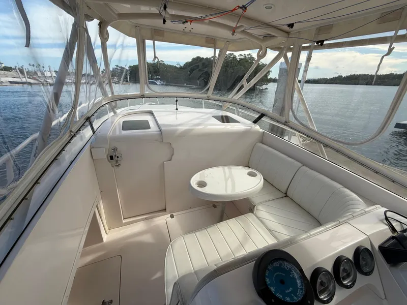 Slide: The Image of 2006 Intrepid 350 Center Console boat interior with seating and control panel. - 9