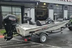 Slide: The Image of 2023 Tracker Pro Team 175 boat on trailer outside dealership. - 5