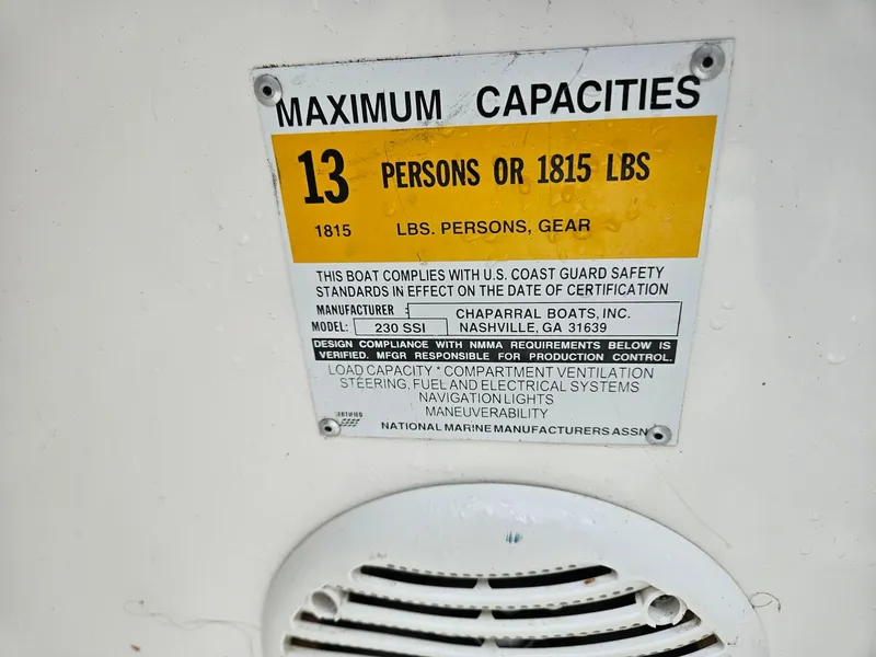 Slide: The Image of Capacity label on 2000 Chaparral 230 SSi boat, max 13 people or 1815 lbs. - 16