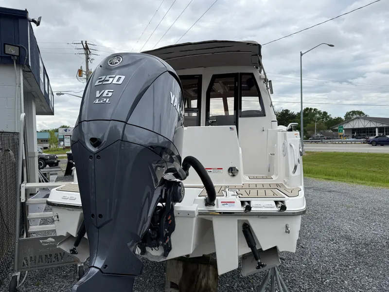 Slide: The Image of 2025 Cutwater C-248 Coupe with Yamaha 250 V6 engine, displayed outdoors. - 3