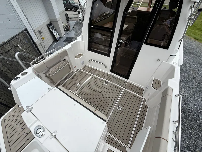Slide: The Image of 2025 Cutwater C-248 Coupe boat deck with sleek design and modern features. - 5