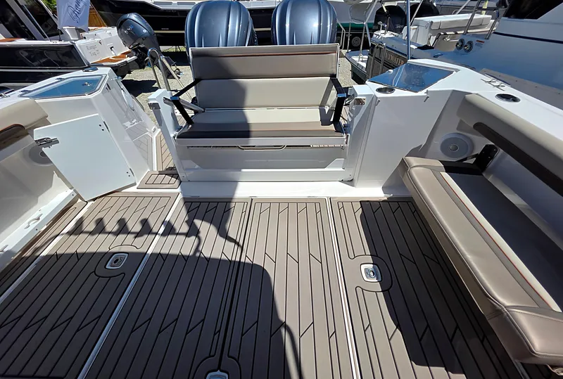 Slide: The Image of 2025 Cutwater C-288 Coupe boat interior with seating and deck details. - 4