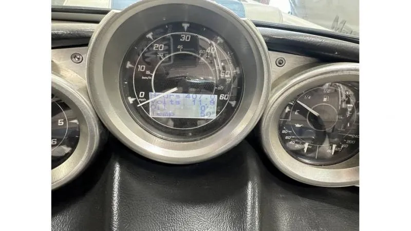 Slide: The Image of Dashboard of a 2012 MasterCraft X45 boat showing speedometer and gauges. - 4