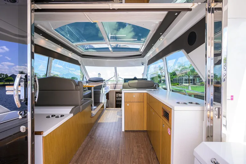 Slide: The Image of Luxurious 2015 Cruisers Cantius yacht interior with modern design and panoramic windows. - 7