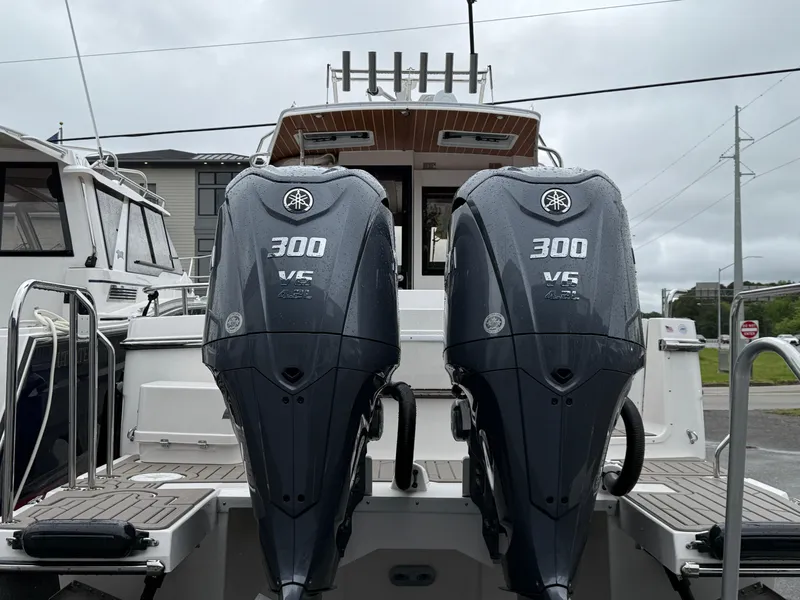 Slide: The Image of 2025 Cutwater C-32 C boat with dual Yamaha 300 V6 outboard engines. - 4
