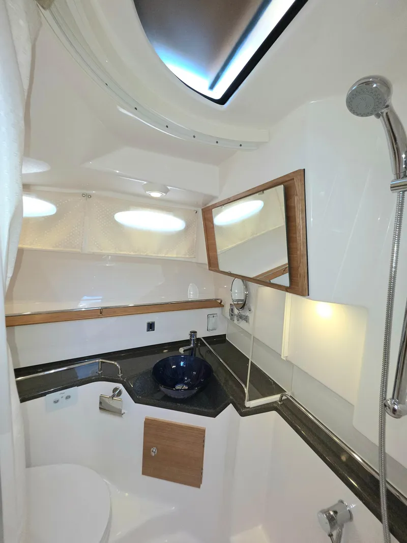 Slide: The Image of 2025 Cutwater C-32 CB yacht bathroom with modern fixtures and sleek design. - 10