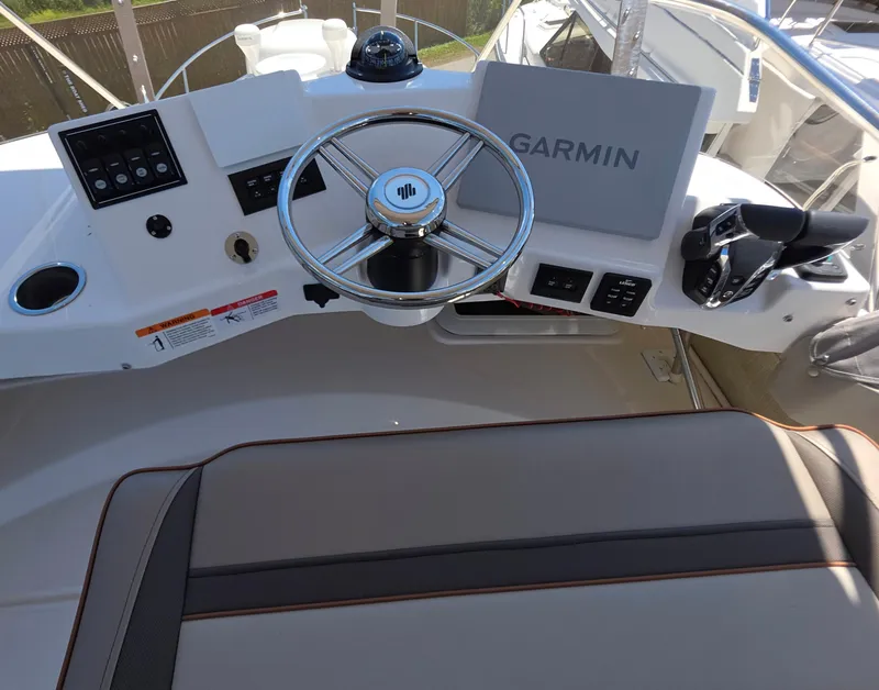 Slide: The Image of Helm of 2025 Cutwater C-32 CB with Garmin navigation system. - 11
