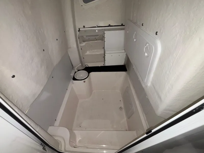 Slide: The Image of 2020 Sea Fox 266 Commander boat interior cabin with storage compartments. - 17
