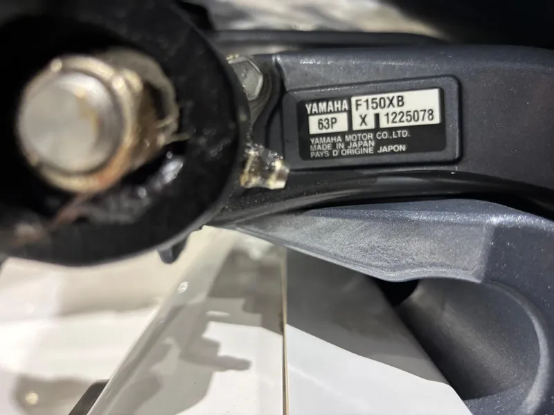 Slide: The Image of Close-up of Yamaha F150XB engine part on 2020 Sea Fox 266 Commander boat. - 27