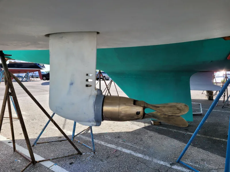 Slide: The Image of Propeller and rudder of a 2001 X-Yachts 332 sailboat on a stand. - 10