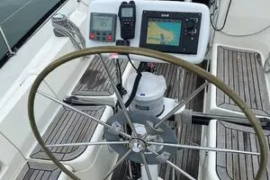 Slide: The Image of Steering wheel and navigation equipment on a 2001 X-Yachts 332 sailboat. - 14