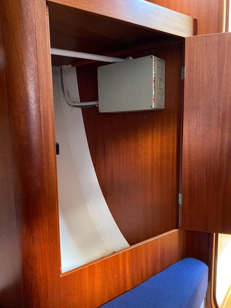 Slide: The Image of Wooden cabinet interior on a 2001 X-Yachts 332 sailboat. - 38