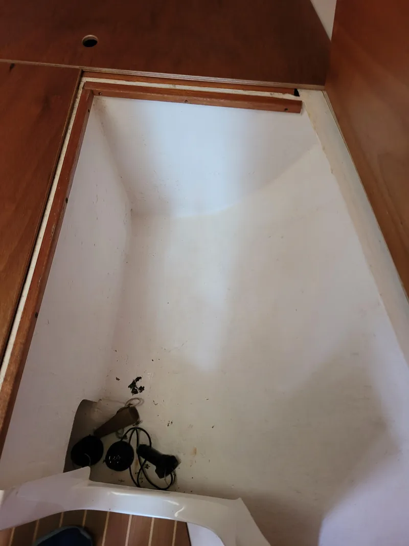 Slide: The Image of Empty storage compartment in 2001 X-Yachts 332 sailboat interior. - 50