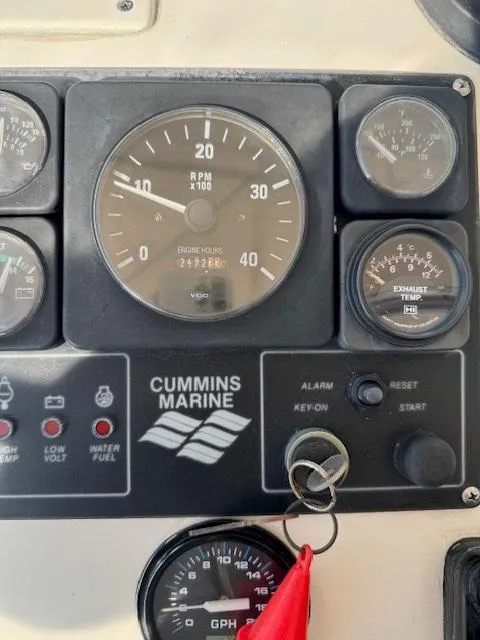 Slide: The Image of Dashboard of a 1989 Egg Harbor 35 Sport Fisherman with Cummins Marine gauges. - 10